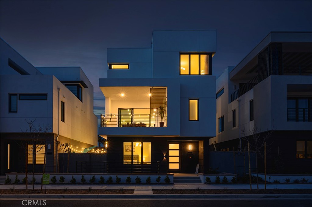 a front view of a building with glass windows