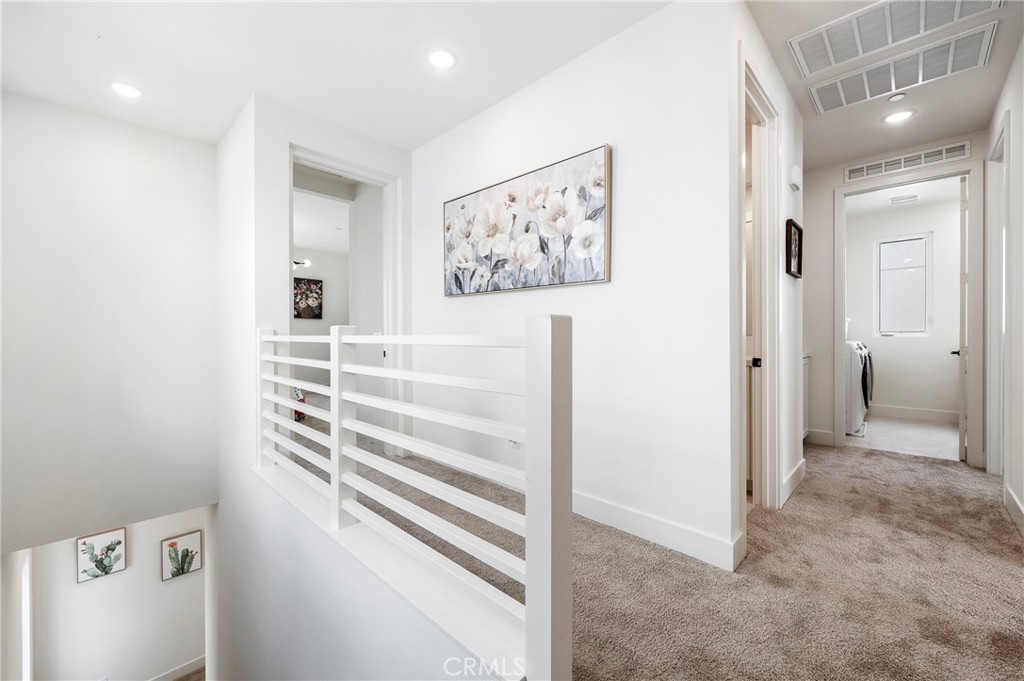 2053 Peebler Way Tustin, CA 92782 - Photo 20 of 37 a view of a hallway with closet and utility room