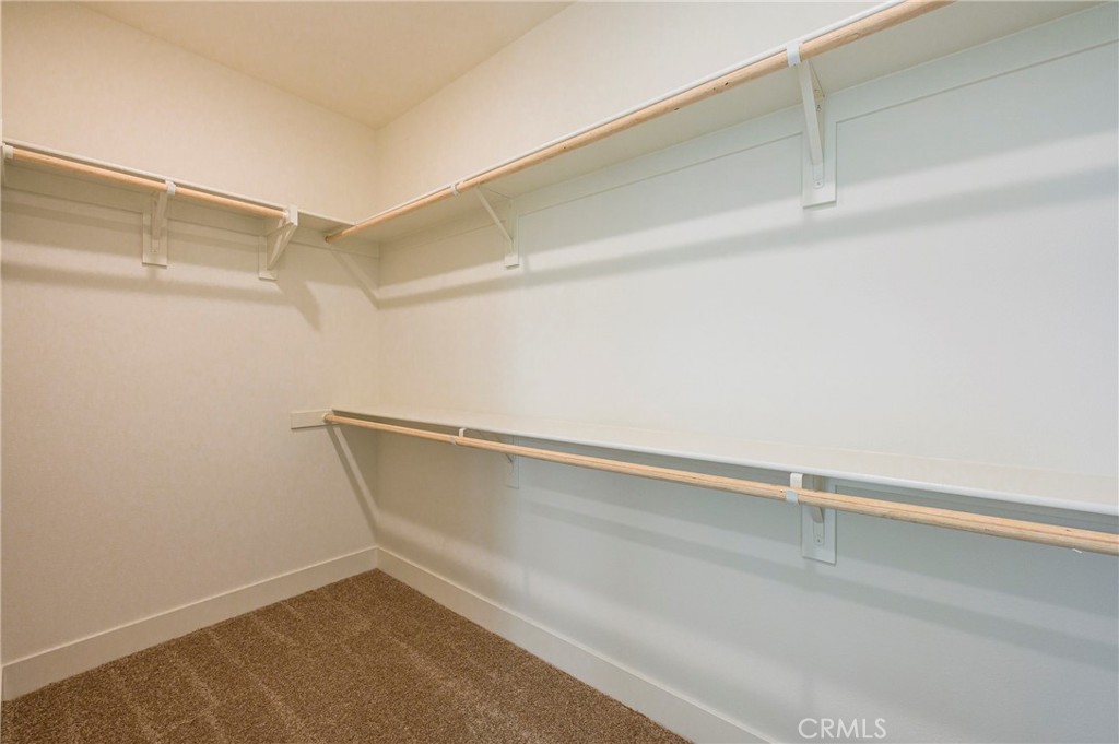 2053 Peebler Way Tustin, CA 92782 - Photo 26 of 37 a view of a room with shelf on the wall