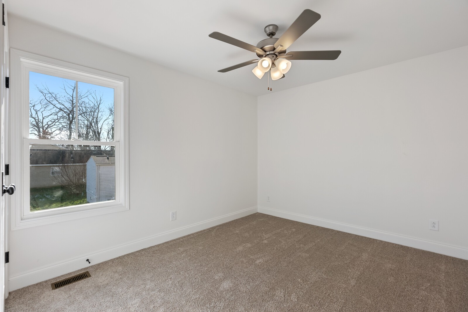 228 19th Avenue West Springfield, TN 37172 - Photo 14 of 15 an empty room with a window