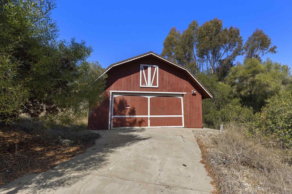 1007 Capra Way Fallbrook, CA 92028 - Photo 11 of 44 a view of a house with a yard
