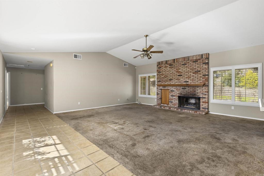 1007 Capra Way Fallbrook, CA 92028 - Photo 29 of 44 a view of an empty room with a fireplace