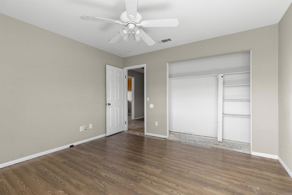 1007 Capra Way Fallbrook, CA 92028 - Photo 44 of 44 a view of an empty room with wooden floor