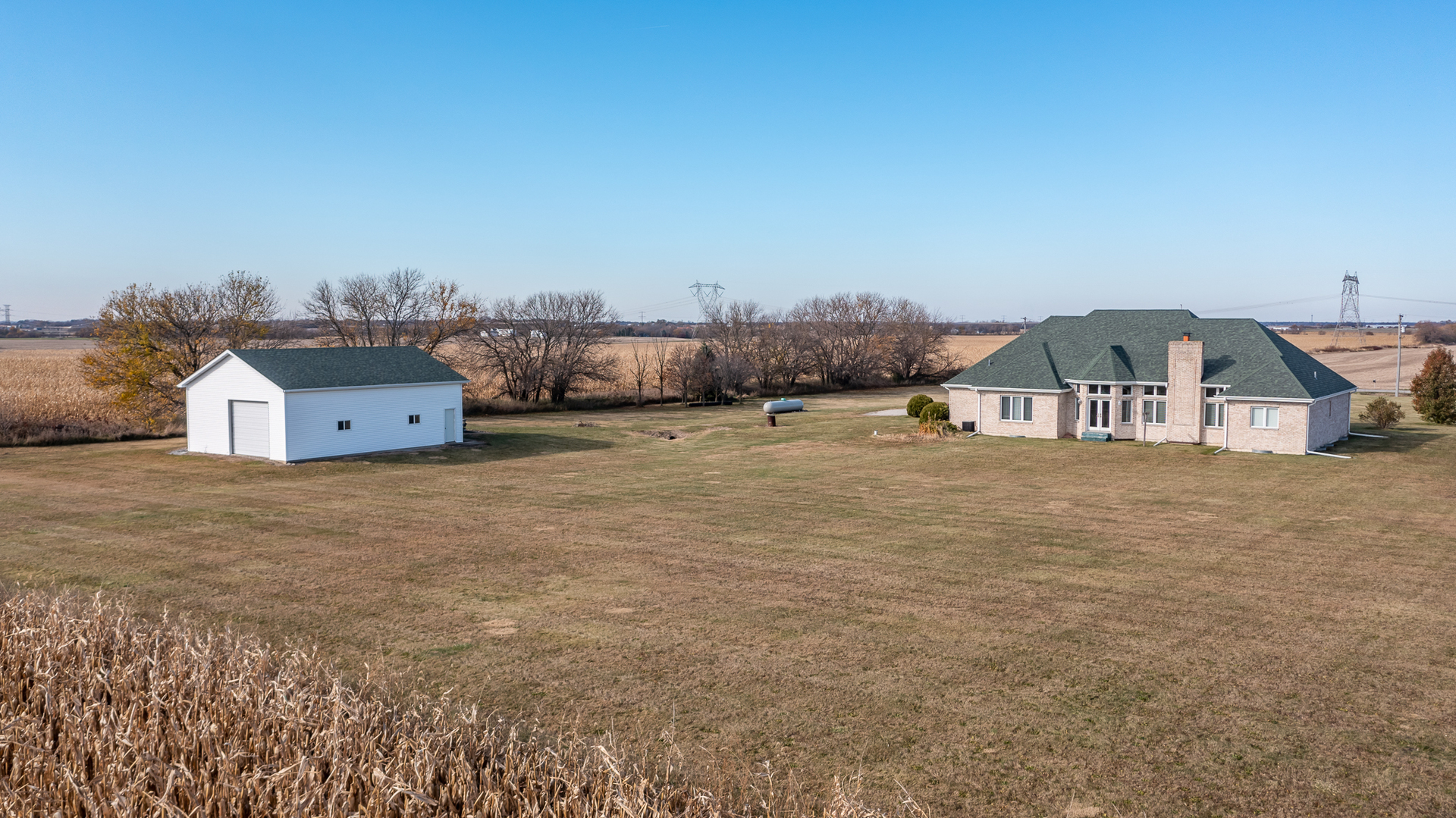 2019 East Kentucky Road Beecher, IL 60401 - Photo 11 of 47 a big house with a field