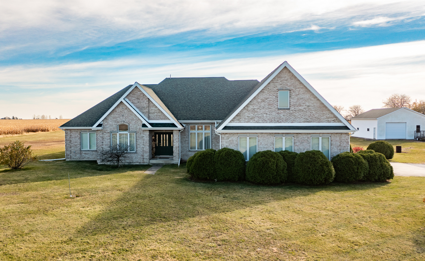 2019 East Kentucky Road Beecher, IL 60401 - Photo 2 of 47 a front view of a house with a yard