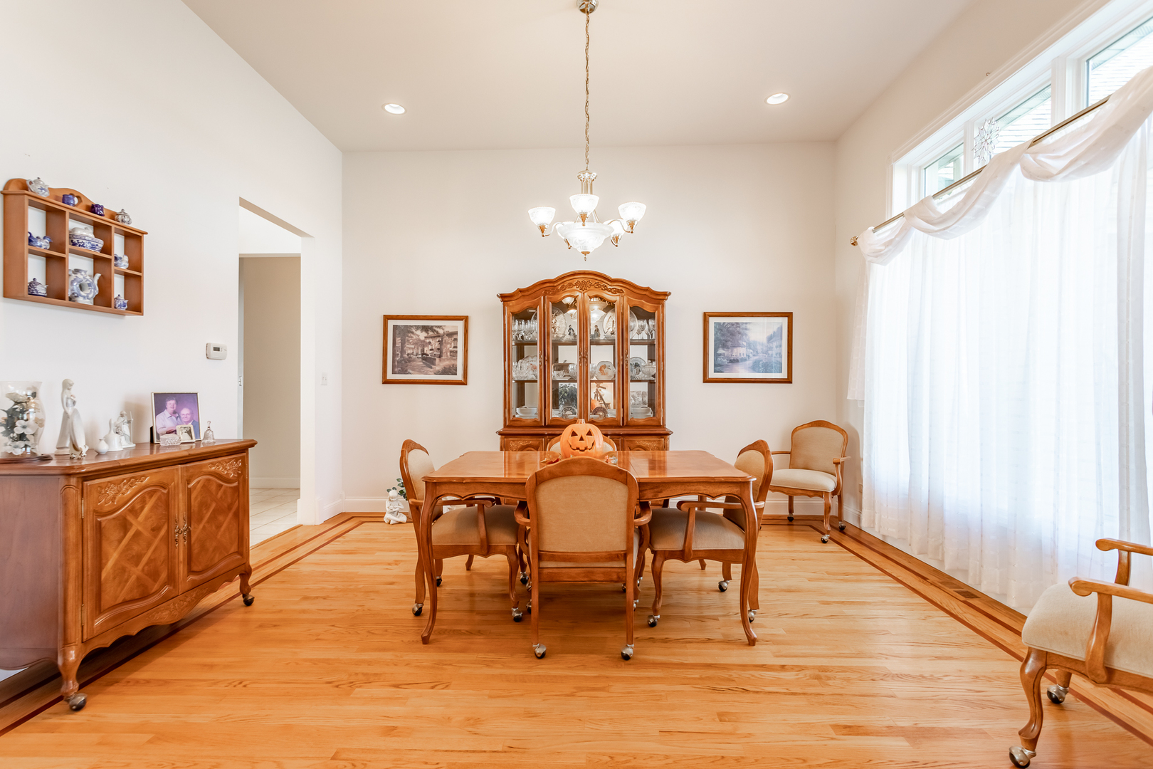 2019 East Kentucky Road Beecher, IL 60401 - Photo 22 of 47 a view of a dining room with furniture window and wooden floor