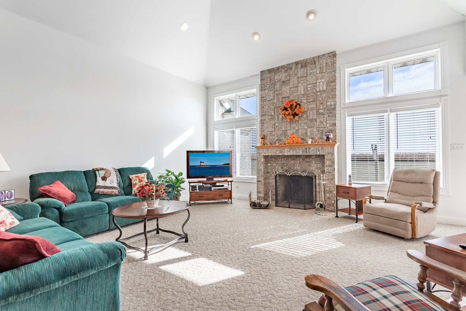 2019 East Kentucky Road Beecher, IL 60401 - Photo 27 of 47 a living room with furniture large window and a fireplace