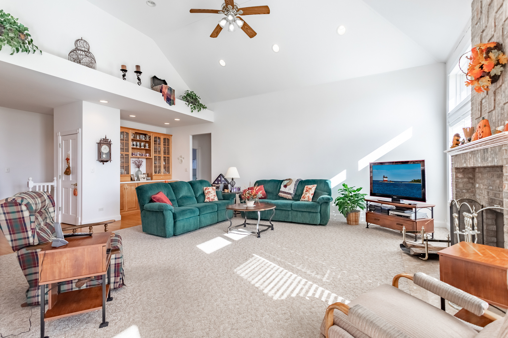 2019 East Kentucky Road Beecher, IL 60401 - Photo 28 of 47 a living room with furniture and a flat screen tv