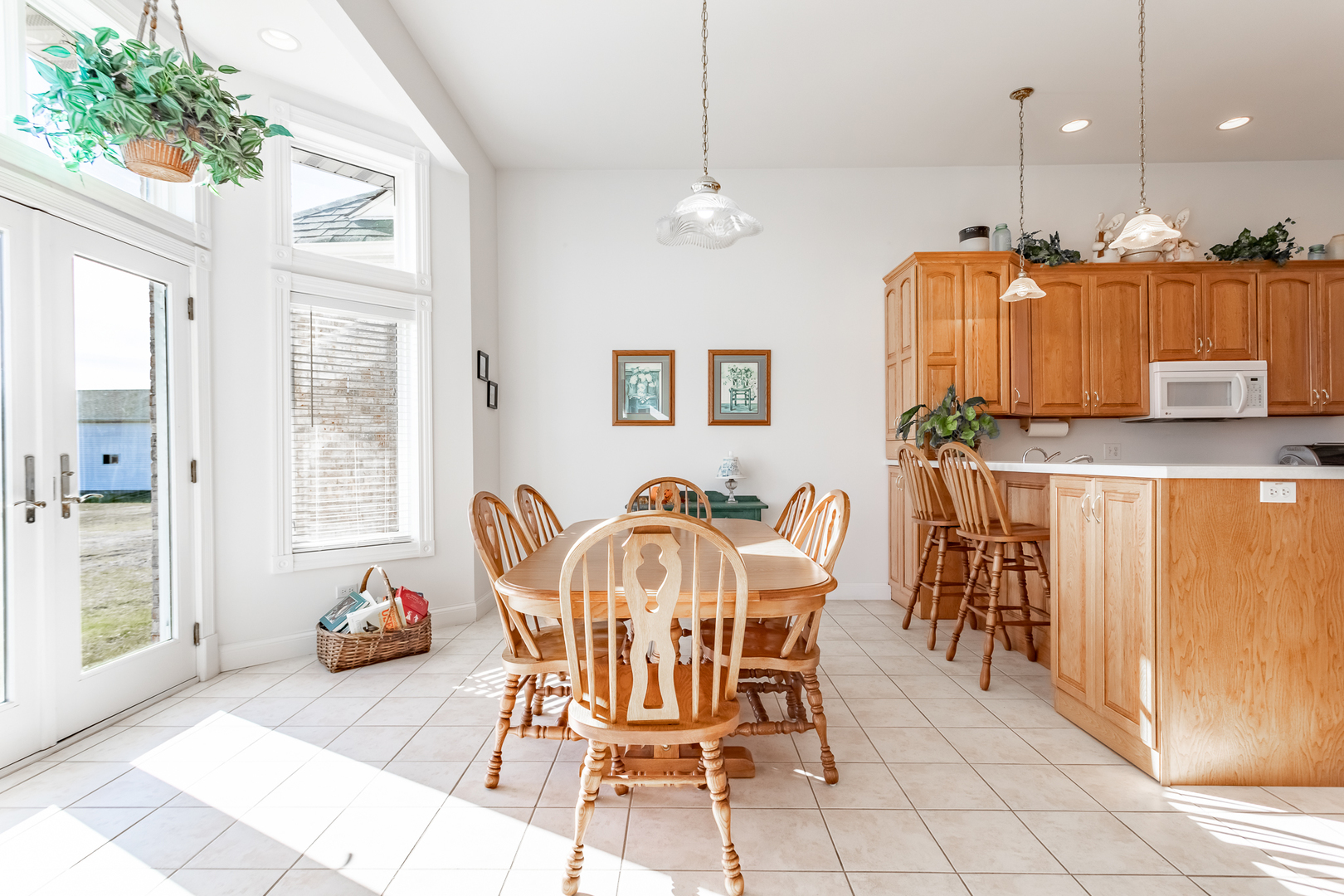 2019 East Kentucky Road Beecher, IL 60401 - Photo 30 of 47 a view of a dining room with furniture and a chandelier