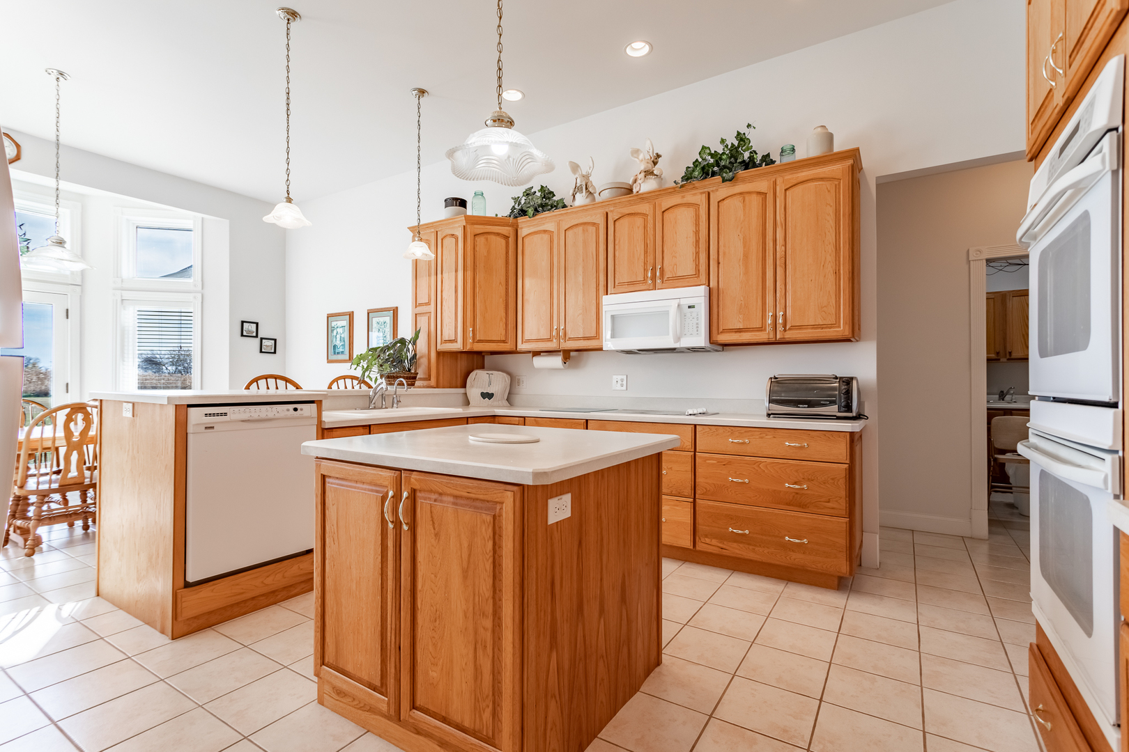2019 East Kentucky Road Beecher, IL 60401 - Photo 34 of 47 a kitchen with stainless steel appliances granite countertop a sink counter space cabinets and a window