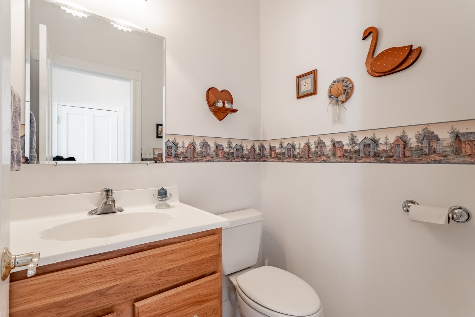 2019 East Kentucky Road Beecher, IL 60401 - Photo 39 of 47 a bathroom with a sink mirror and toilet