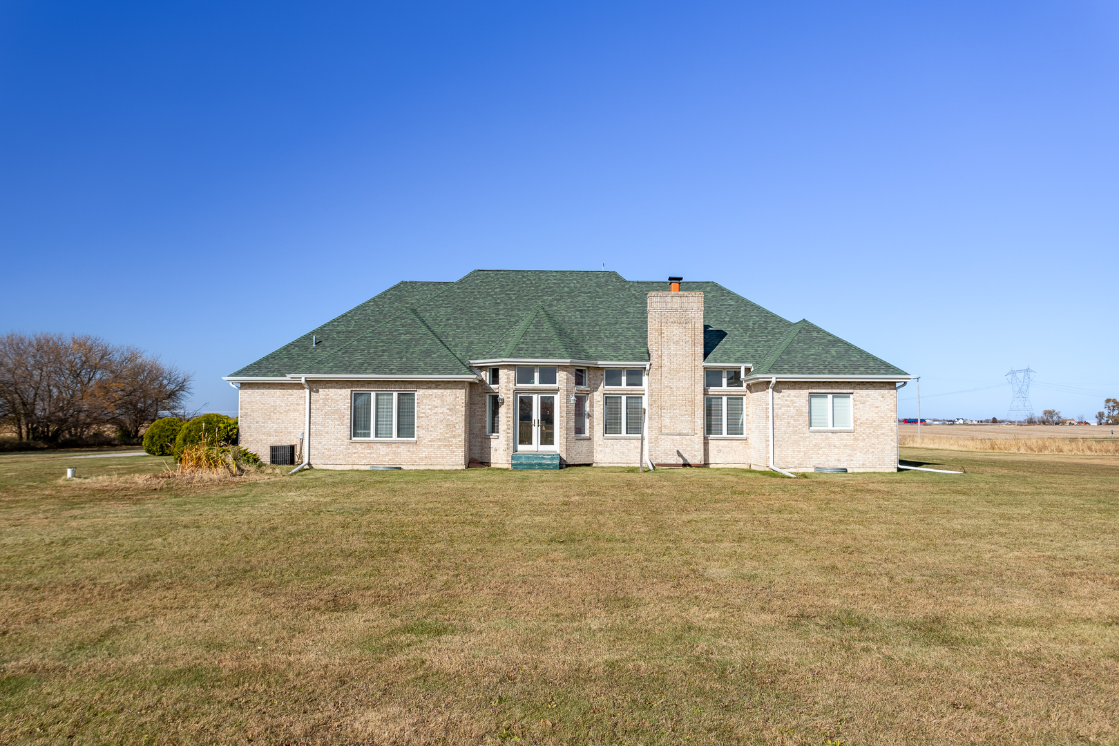 2019 East Kentucky Road Beecher, IL 60401 - Photo 6 of 47 a house that has a big yard with wooden fence