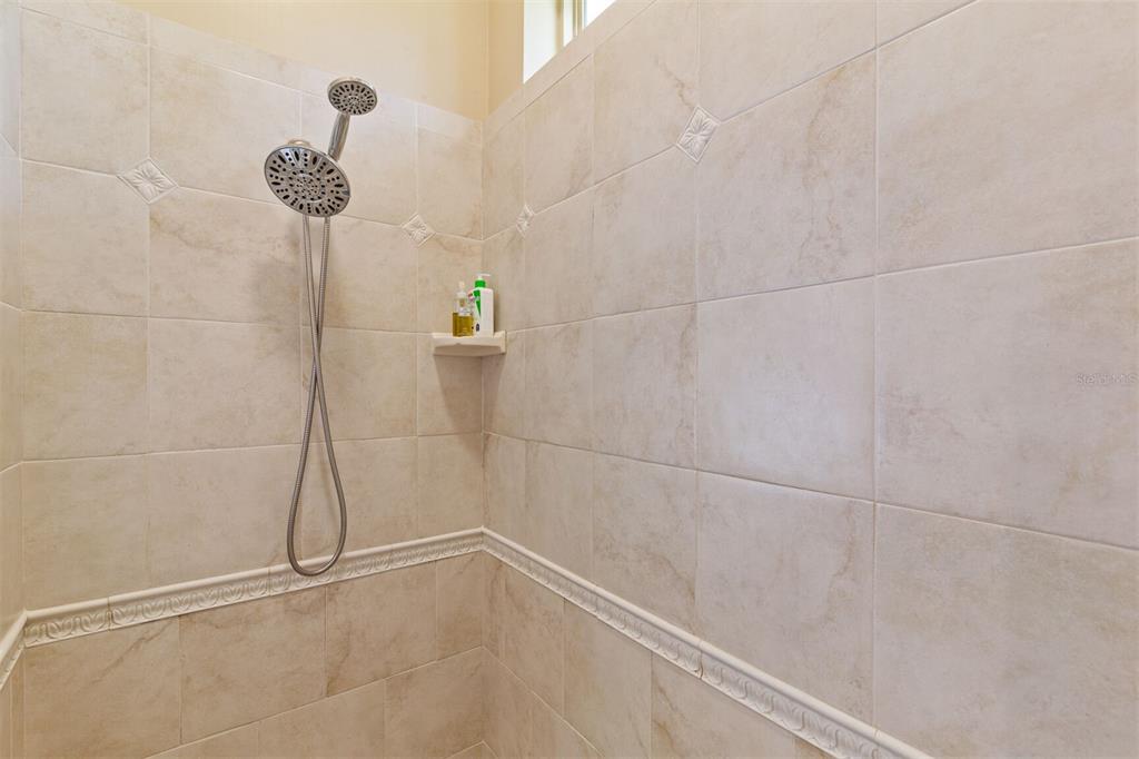 10257 Southwest 37 Place Gainesville, FL 32608 - Photo 25 of 44 a bathroom with a shower