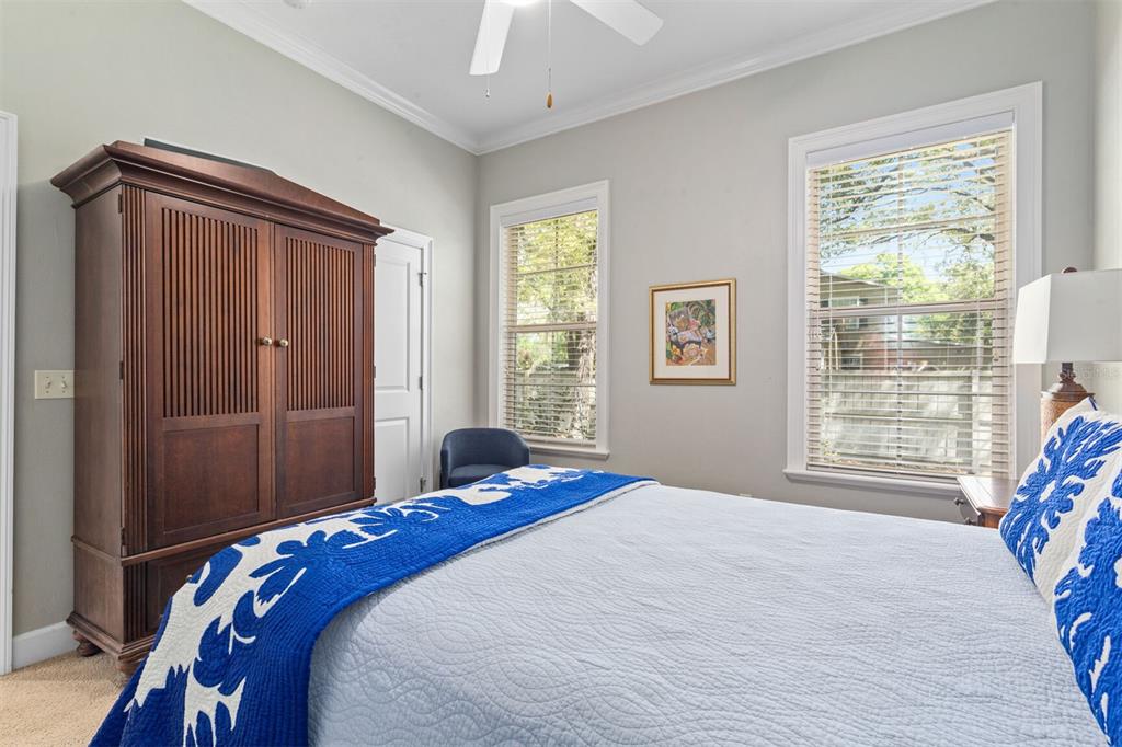 10257 Southwest 37 Place Gainesville, FL 32608 - Photo 28 of 44 a bedroom with a bed and a window