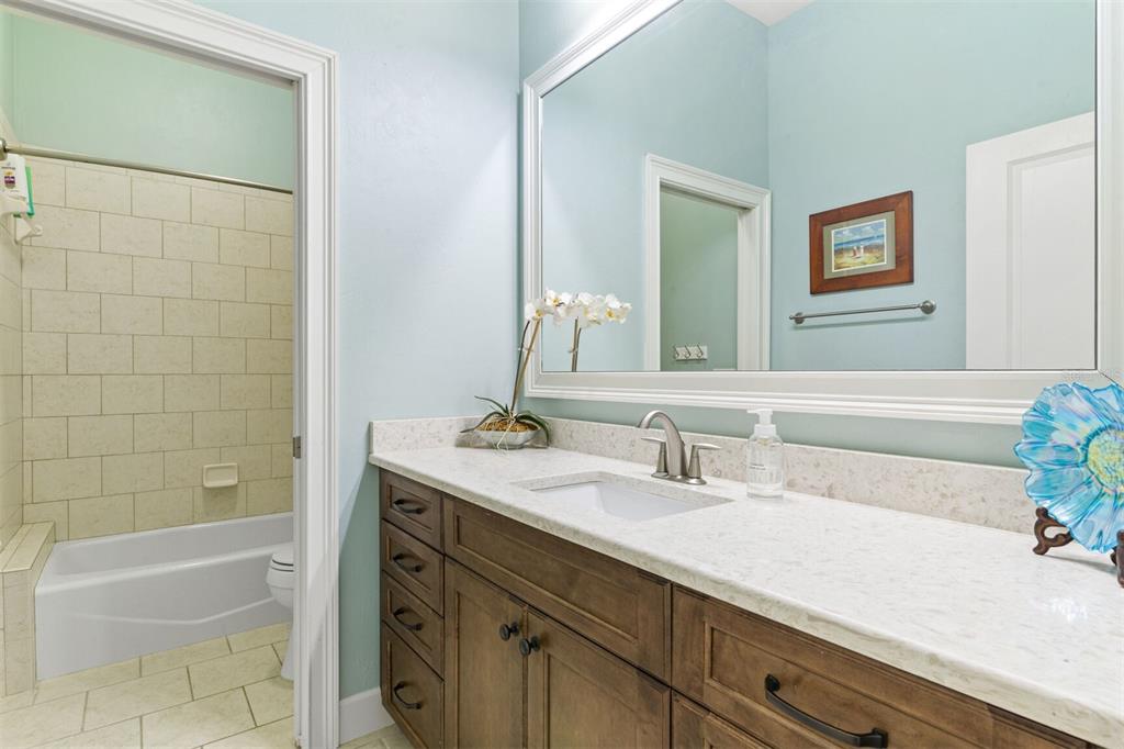 10257 Southwest 37 Place Gainesville, FL 32608 - Photo 29 of 44 a bathroom with a sink and a bathtub