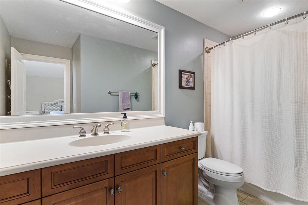 10257 Southwest 37 Place Gainesville, FL 32608 - Photo 34 of 44 a bathroom with a sink toilet and shower