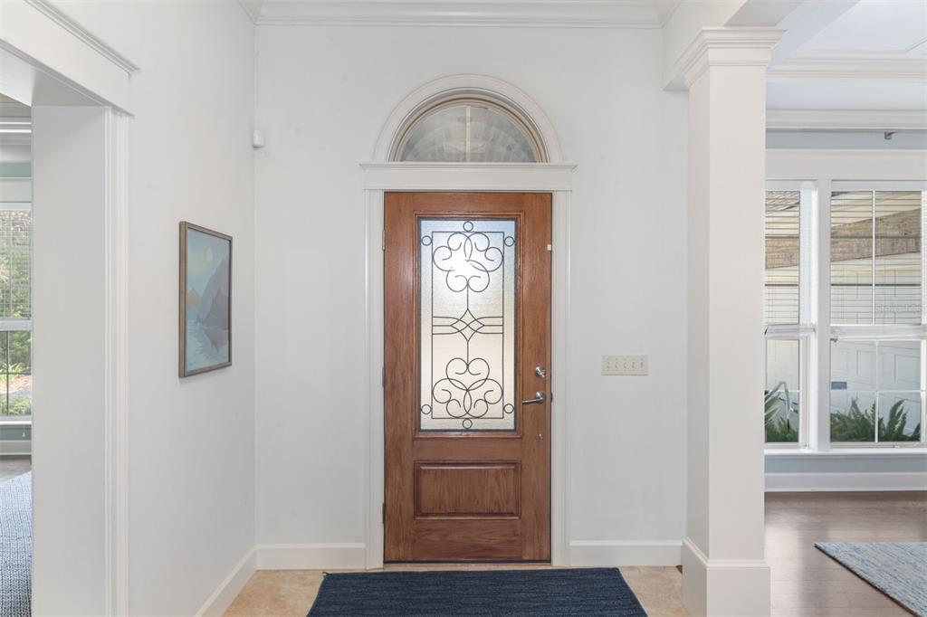 10257 Southwest 37 Place Gainesville, FL 32608 - Photo 5 of 44 a view of front door with wooden floor