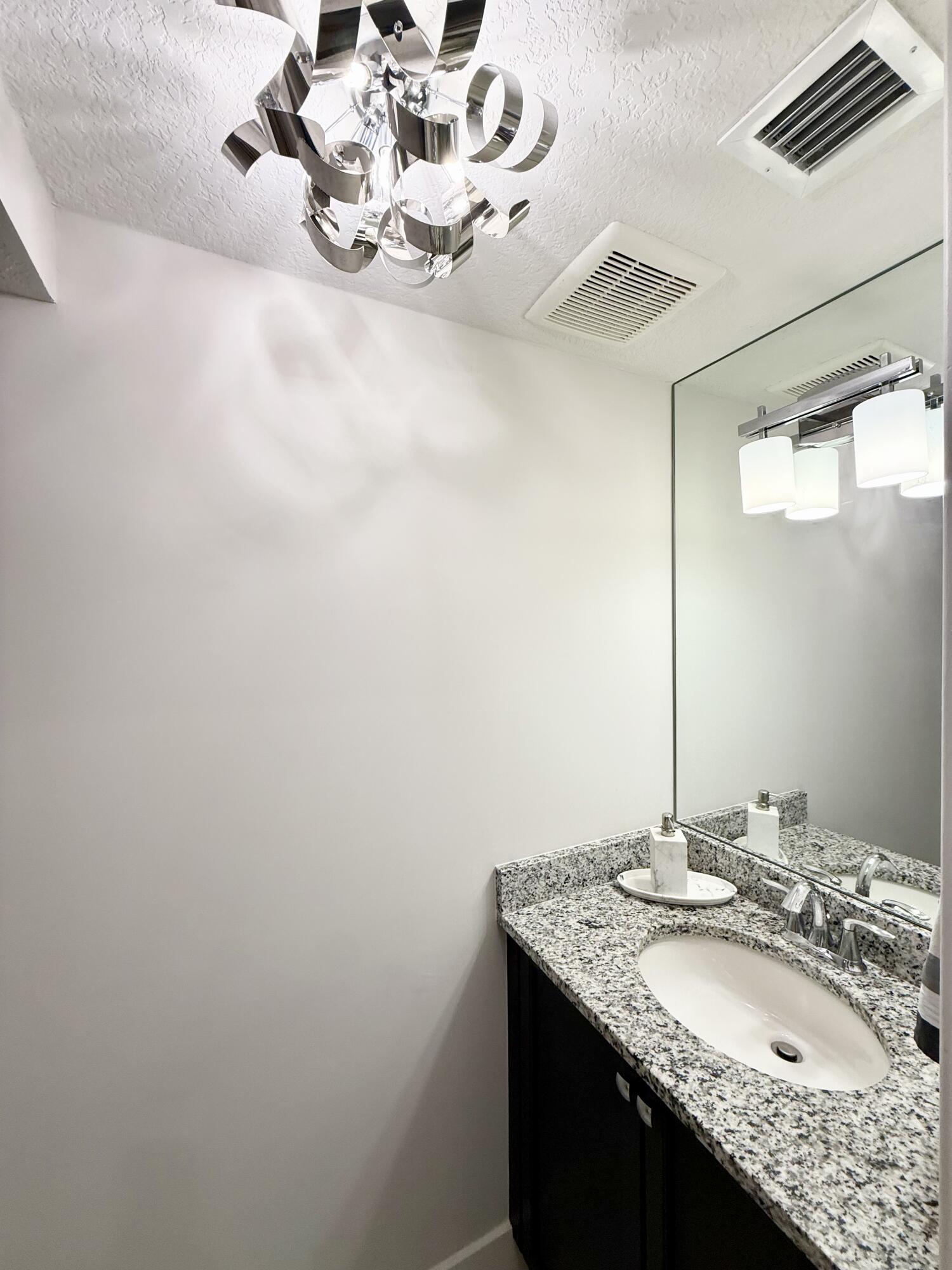 11425 Pointe Midtown Drive Palm Beach Gardens, FL 33418 - Photo 22 of 47 Powder Room
