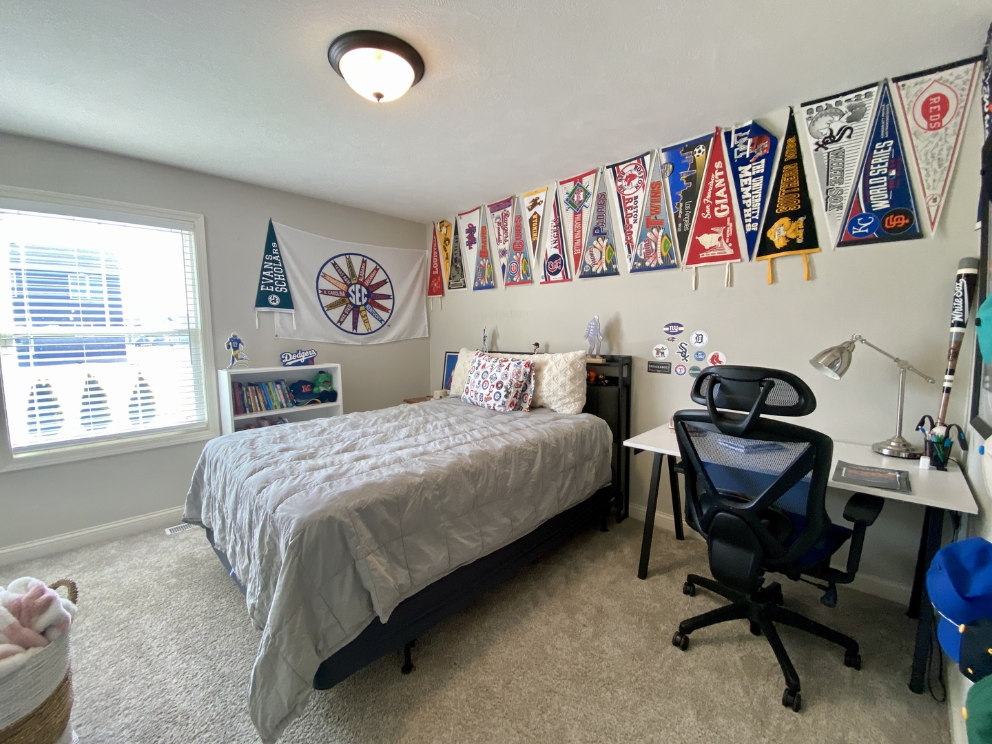 718 Cole Lane Mahomet, IL 61853 - Photo 13 of 22 a bedroom with a bed and a desk