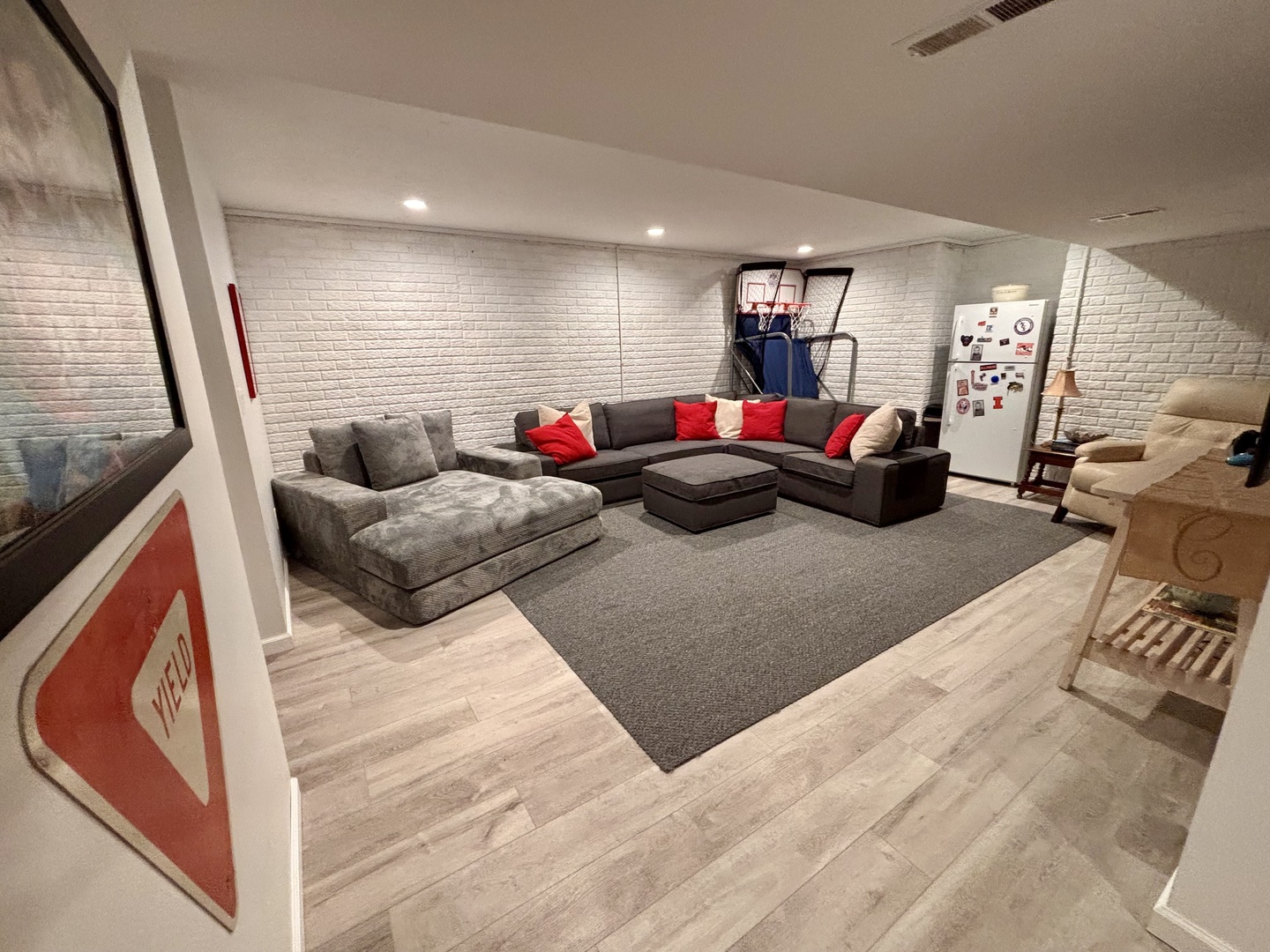 718 Cole Lane Mahomet, IL 61853 - Photo 18 of 22 a living room with furniture and a flat screen tv