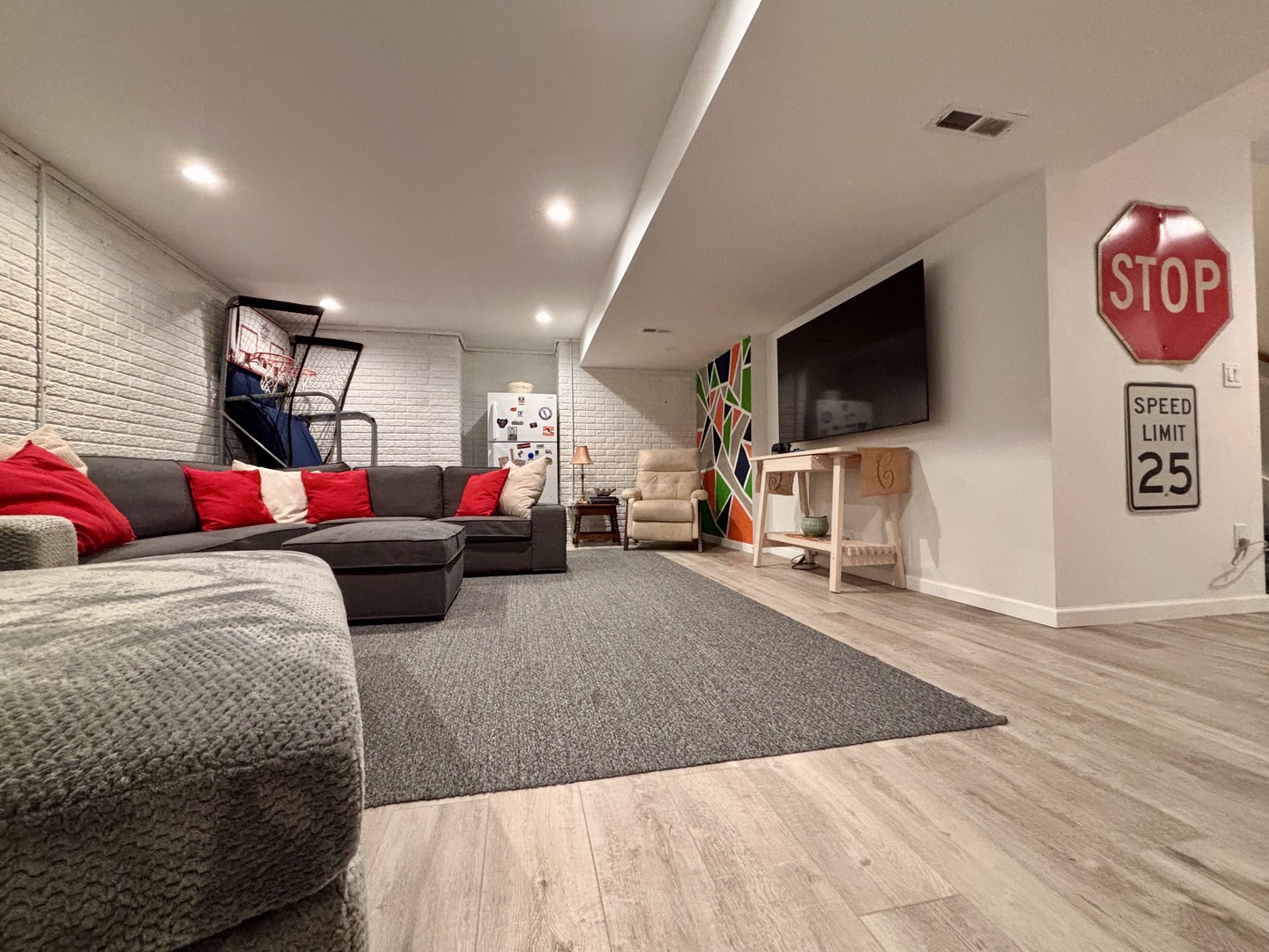 718 Cole Lane Mahomet, IL 61853 - Photo 19 of 22 a living room with furniture and a flat screen tv