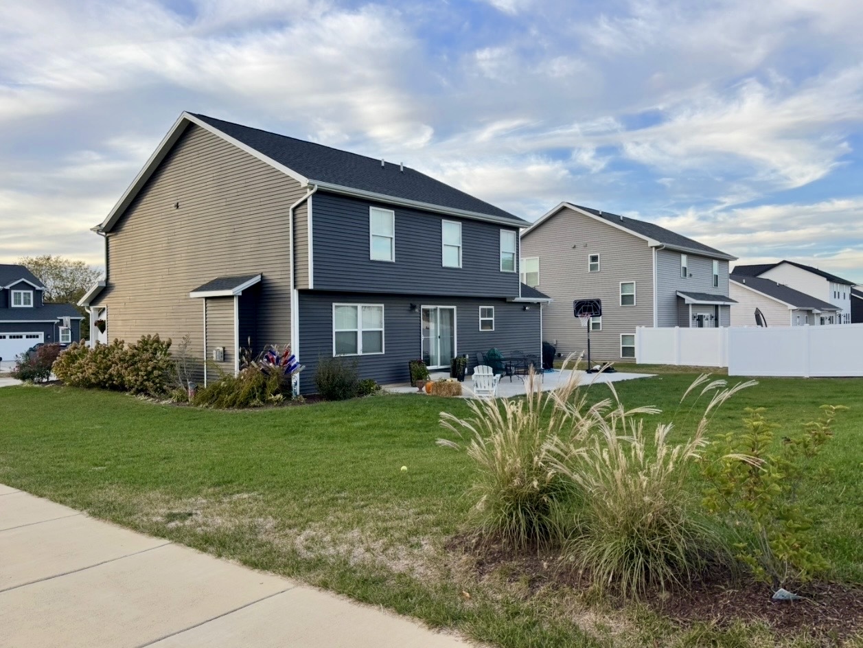 718 Cole Lane Mahomet, IL 61853 - Photo 22 of 22 a front view of a house with garden