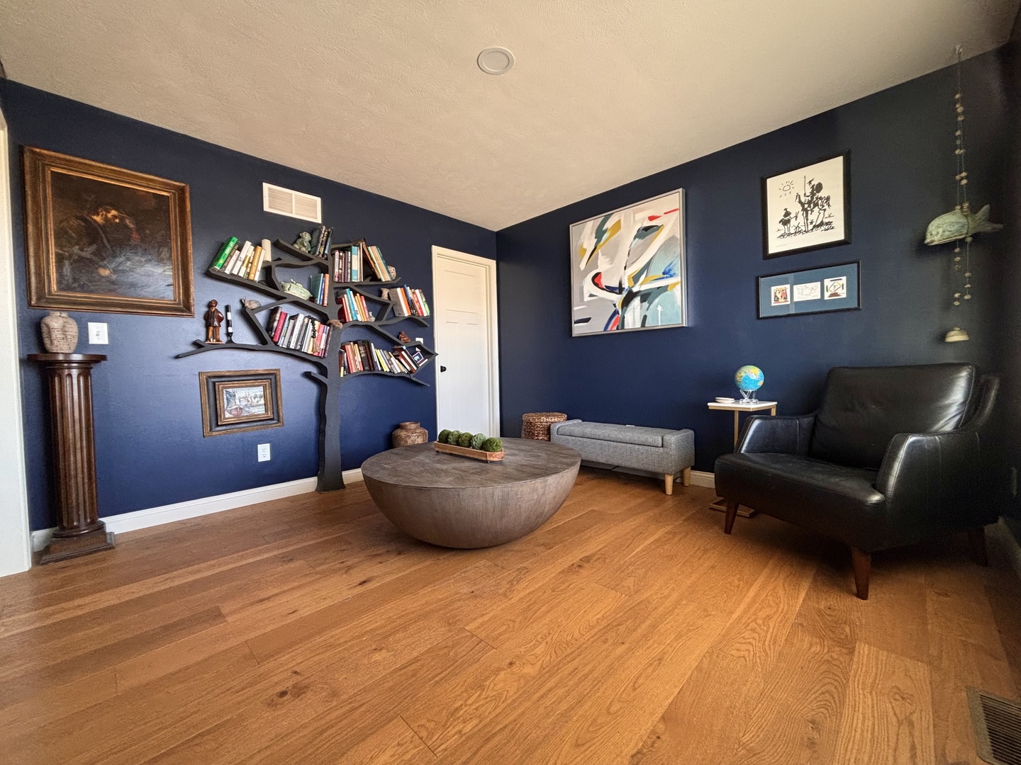 718 Cole Lane Mahomet, IL 61853 - Photo 8 of 22 a living room with furniture and wall paintings