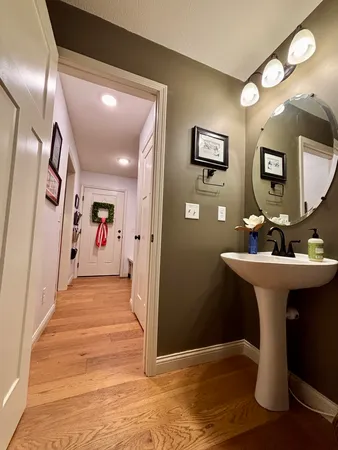 a view of a hallway with seating area