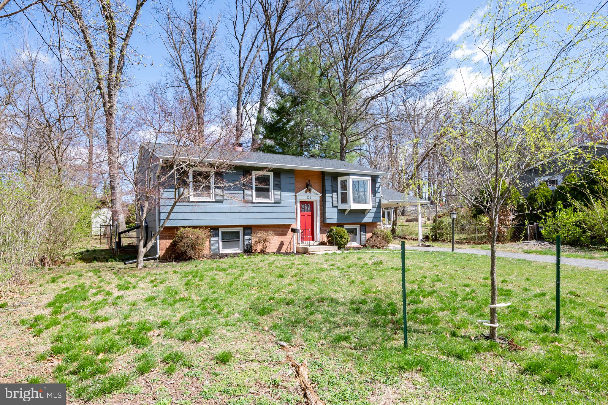 124 Woodland Road Gaithersburg, MD 20877 - Photo 3 of 79 a view of house with a backyard
