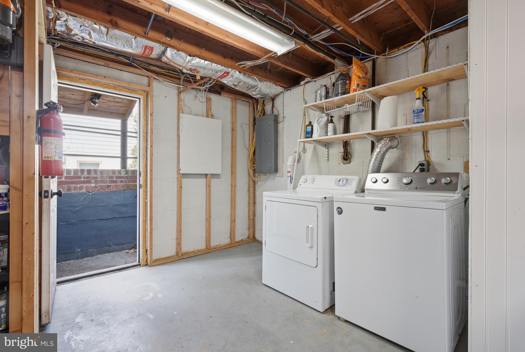 124 Woodland Road Gaithersburg, MD 20877 - Photo 44 of 79 a utility room with dryer and washer