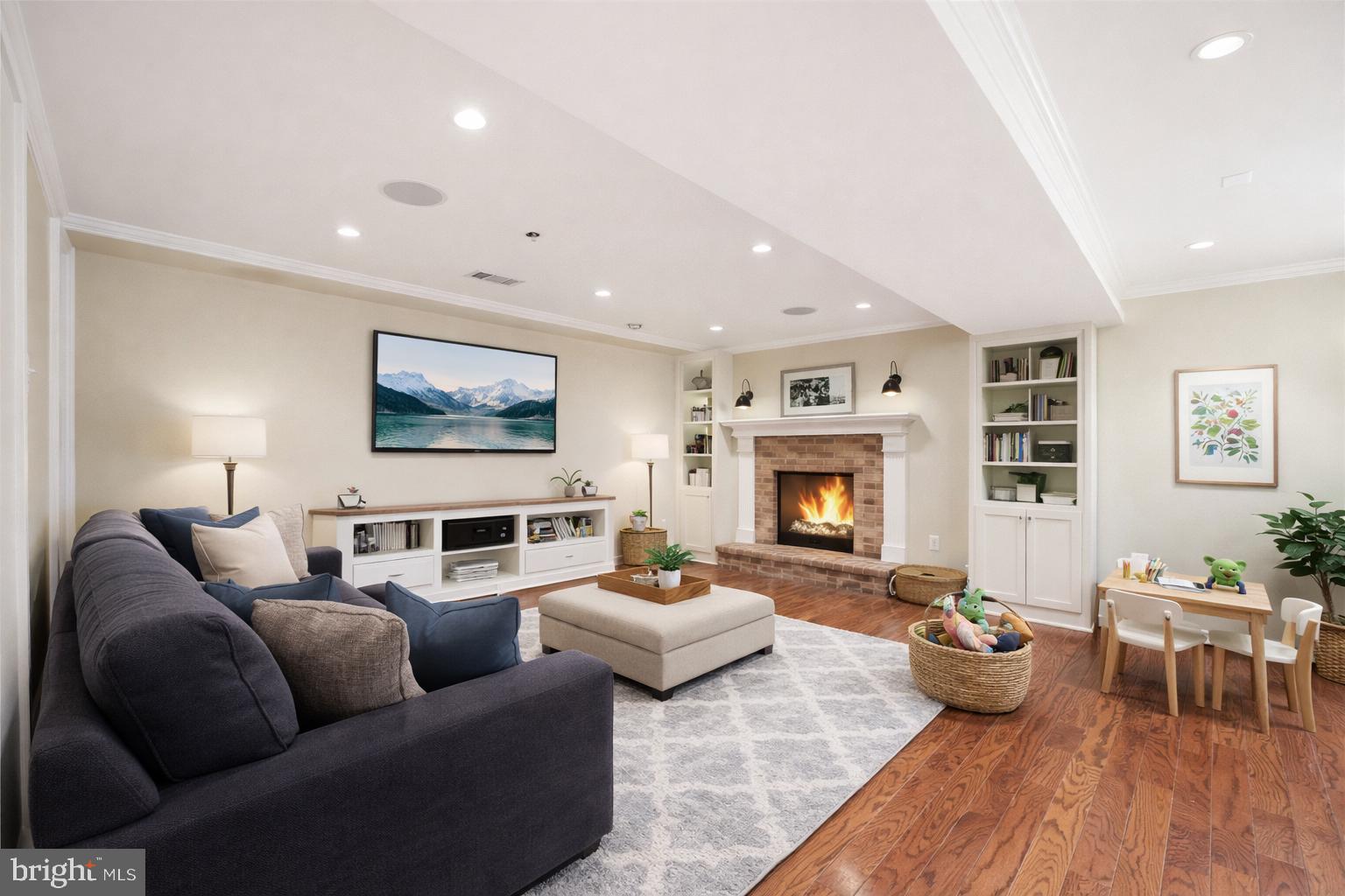 124 Woodland Road Gaithersburg, MD 20877 - Photo 48 of 79 a living room with furniture or couch and a fireplace