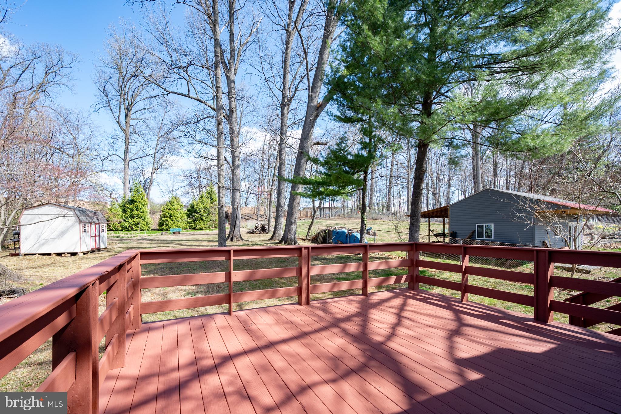 124 Woodland Road Gaithersburg, MD 20877 - Photo 50 of 79 a view of outdoor space with seating