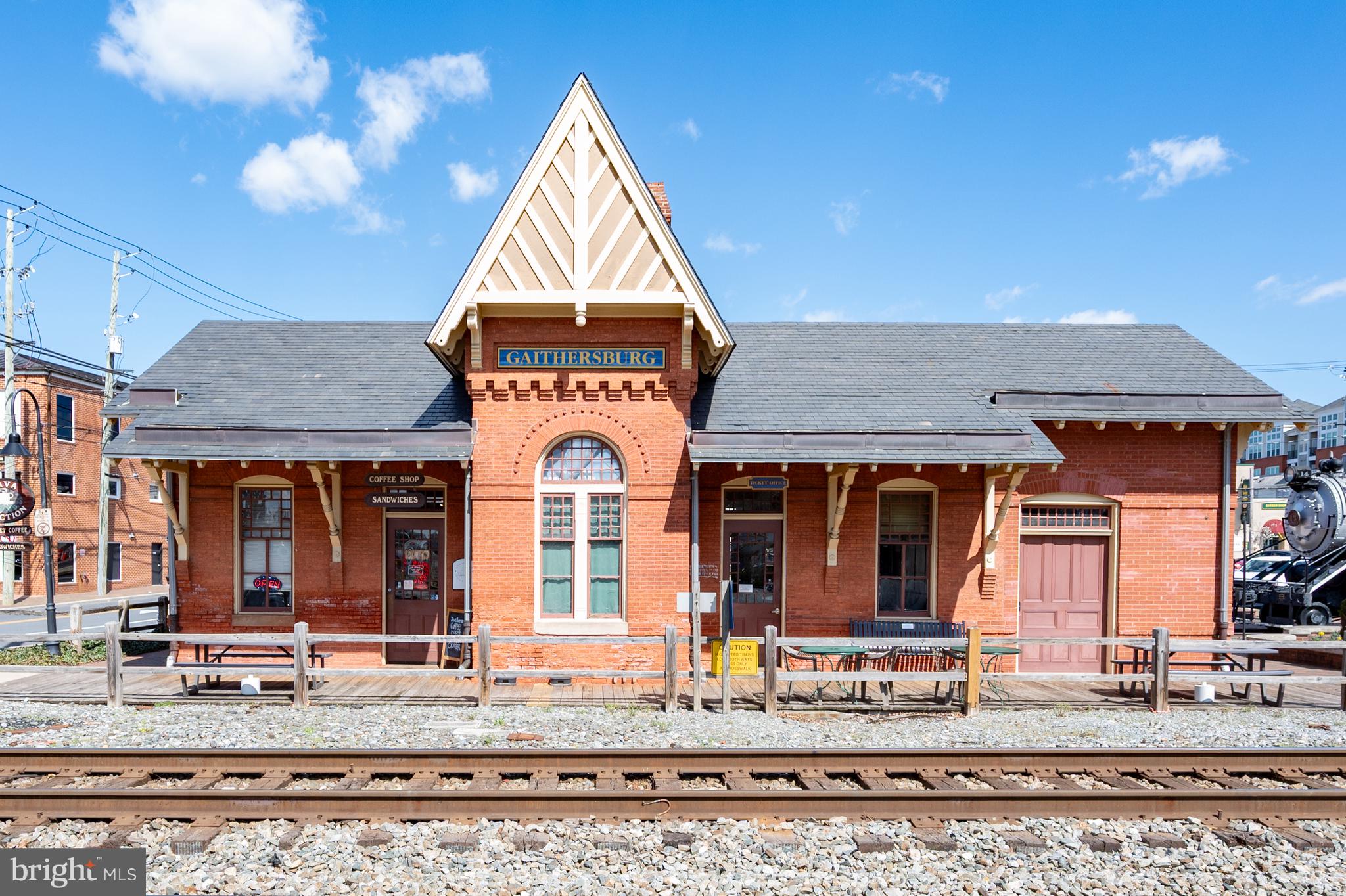 124 Woodland Road Gaithersburg, MD 20877 - Photo 69 of 79 a view of a brick house with large windows