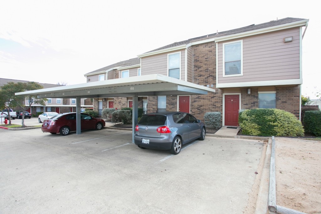 2018 West Rundberg Lane, Unit 10D Austin, TX 78758 - Photo 1 of 1 a view of a car park in front of house
