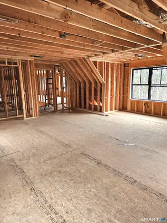 a view of a room with windows