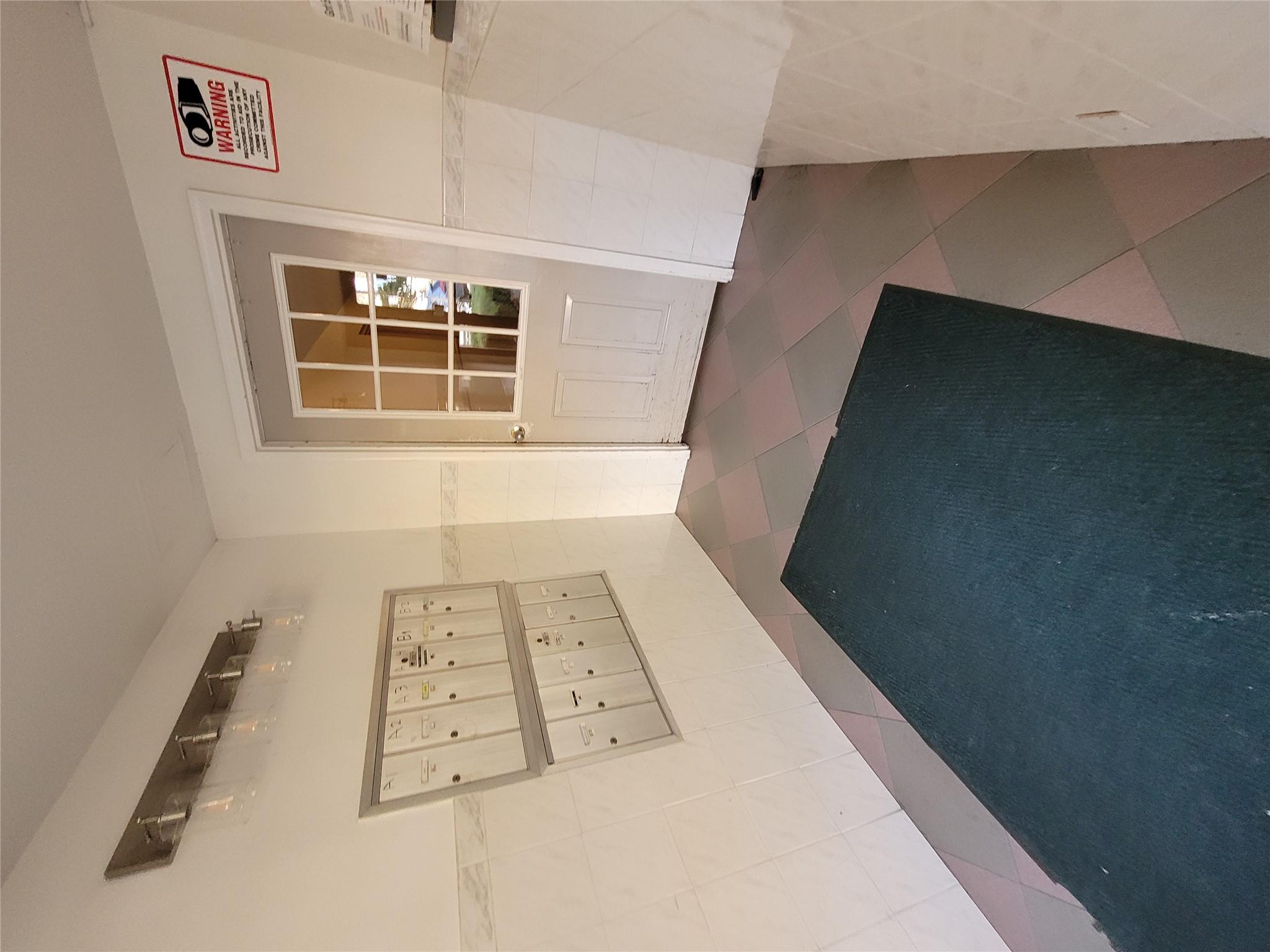 1124 67th Street, Unit A3 Brooklyn, NY 11219 - Photo 2 of 20 View of doorway to property