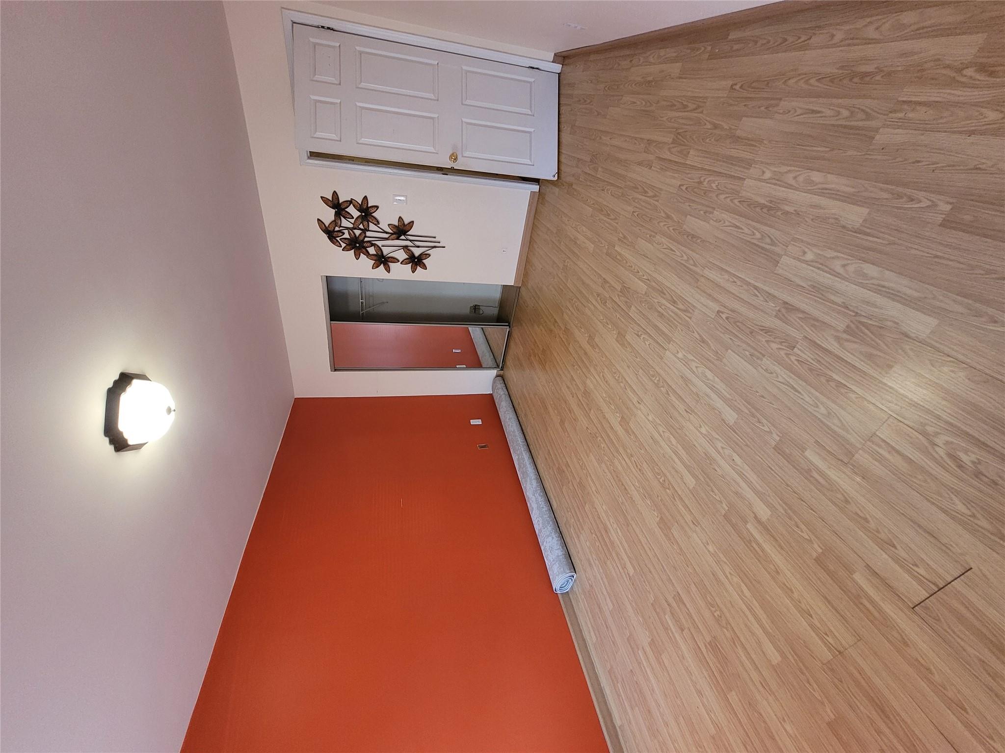 1124 67th Street, Unit A3 Brooklyn, NY 11219 - Photo 9 of 20 Spare room with light wood finished floors and baseboards