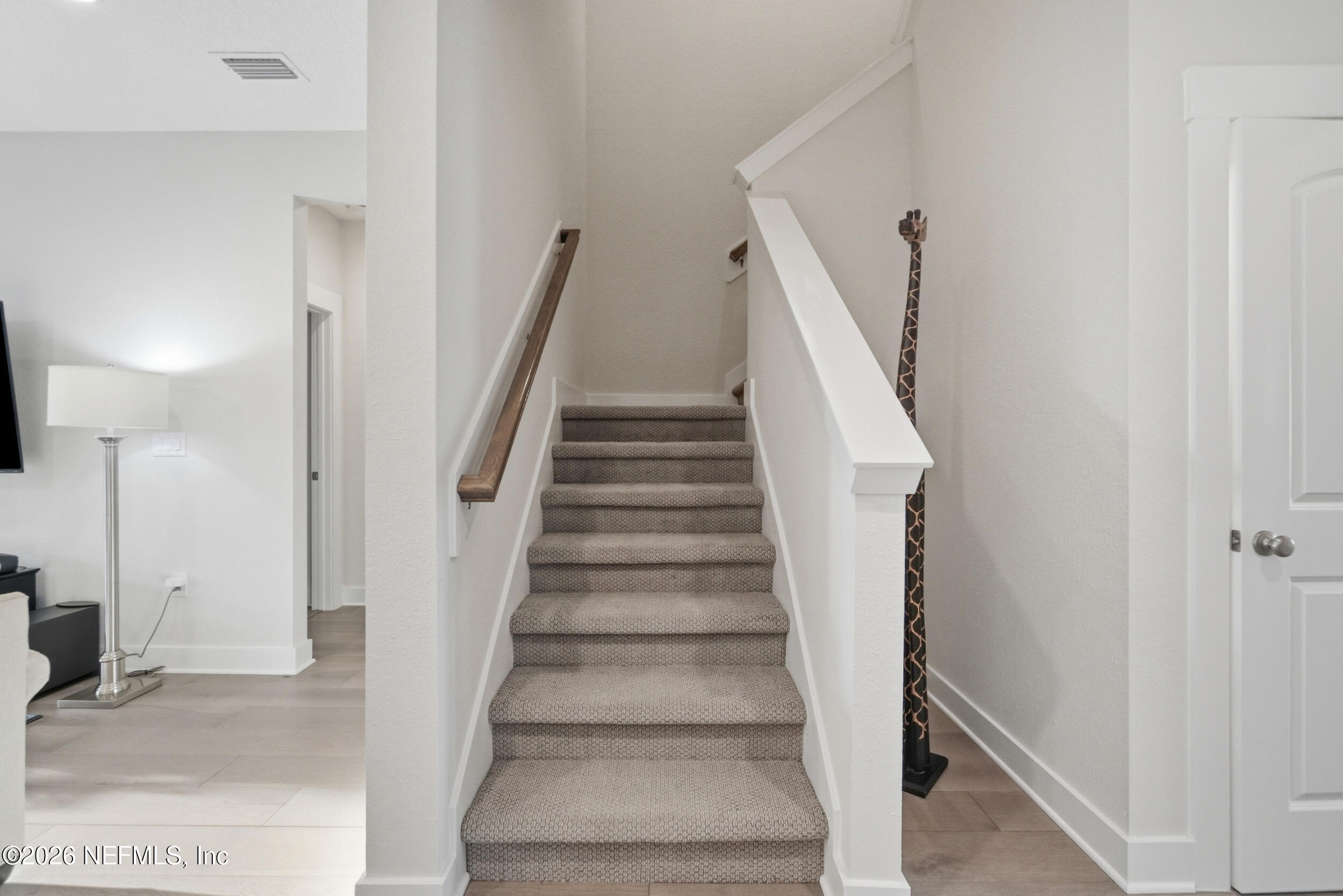 34 Red Rock Lane St. Johns, FL 32259 - Photo 31 of 71 a view of staircase with white walls and white walls