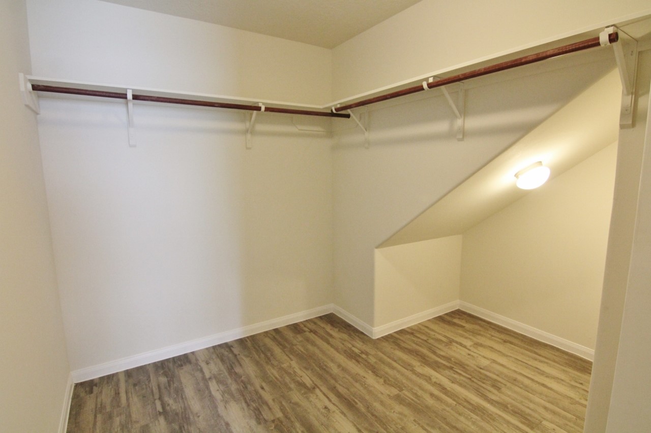 5486 Quail Cove Lane Houston, TX 77053 - Photo 6 of 7 a view of an empty walk in closet