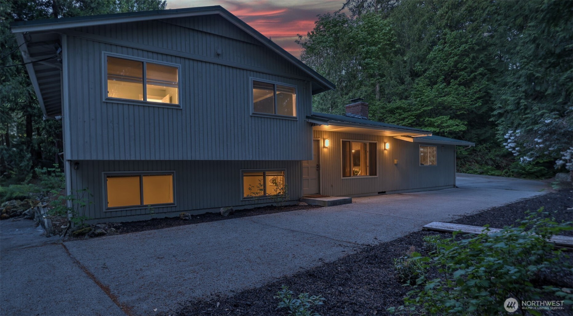 19134 Southeast May Valley Road Issaquah, WA 98027 - Photo 1 of 30 a house view with a backyard space