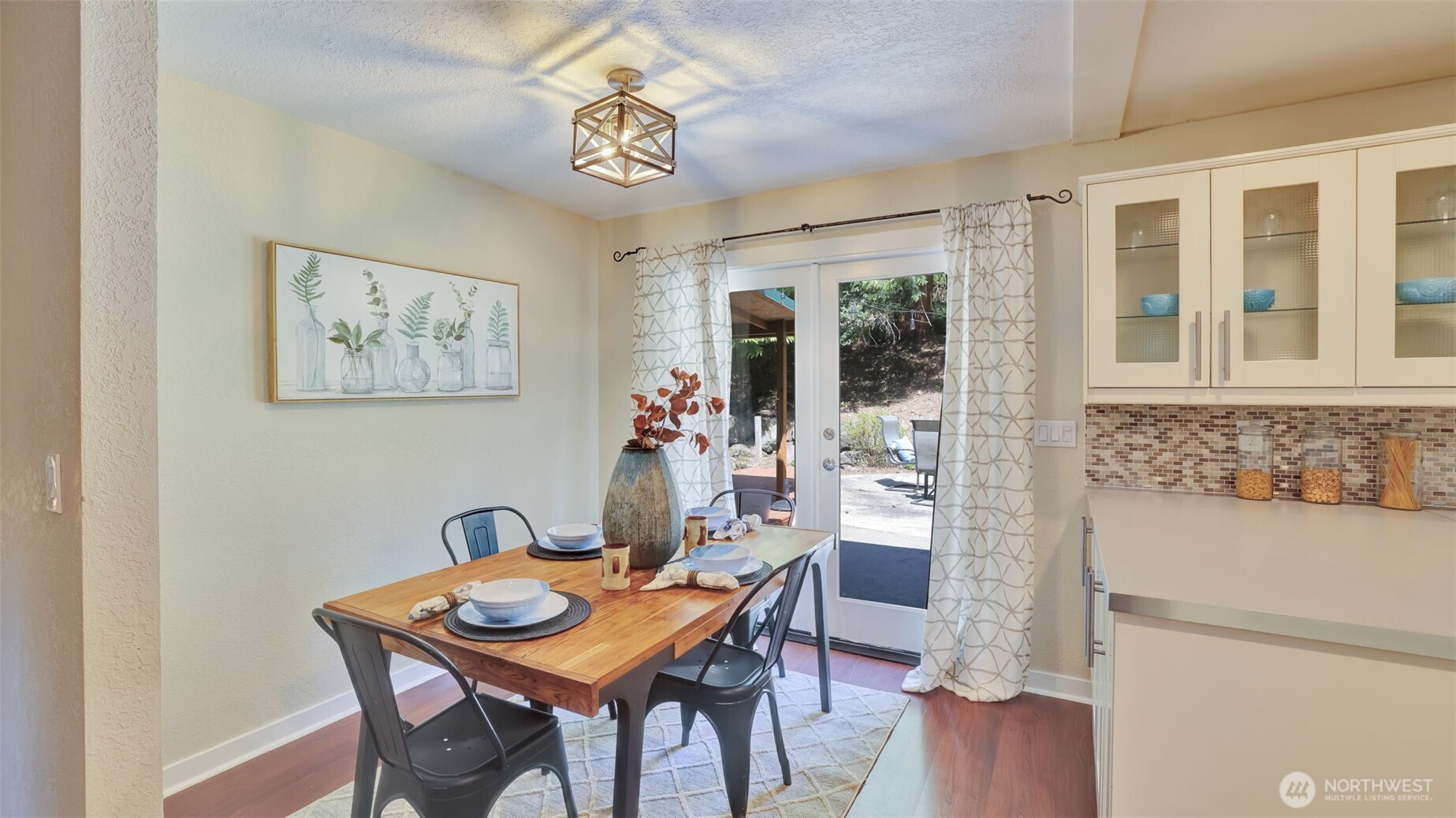 19134 Southeast May Valley Road Issaquah, WA 98027 - Photo 5 of 30 a view of a dining room with furniture window and outside view