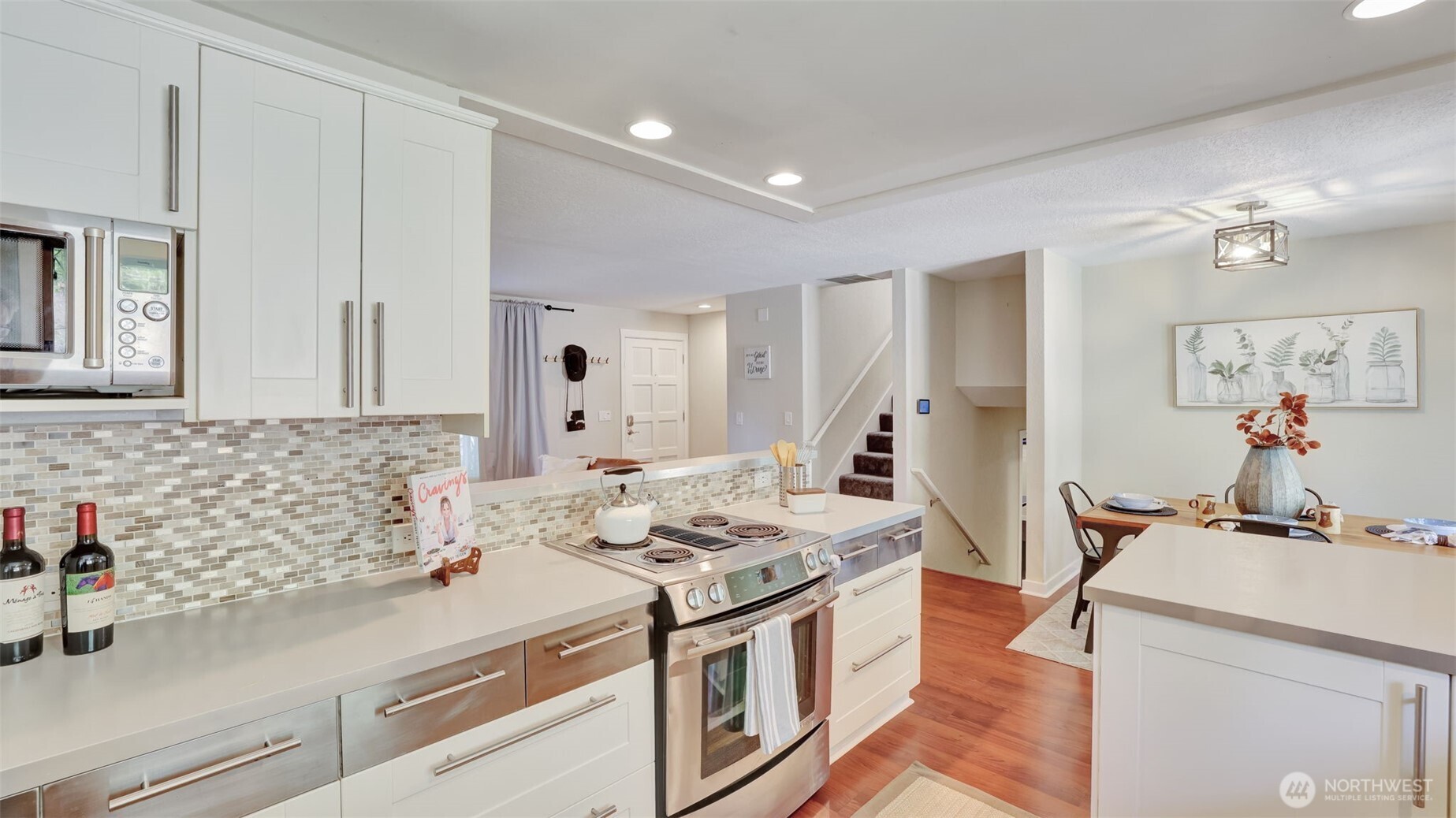 19134 Southeast May Valley Road Issaquah, WA 98027 - Photo 8 of 30 a bathroom with a sink and a mirror