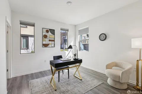 a workspace with furniture and window