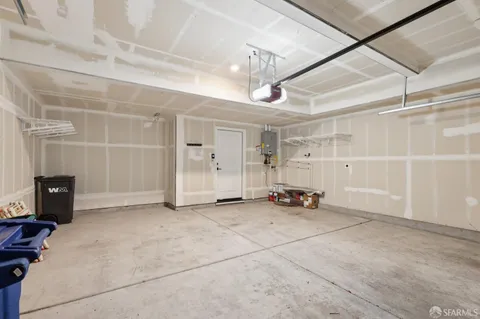 a kitchen with stainless steel appliances granite countertop a stove and a refrigerator