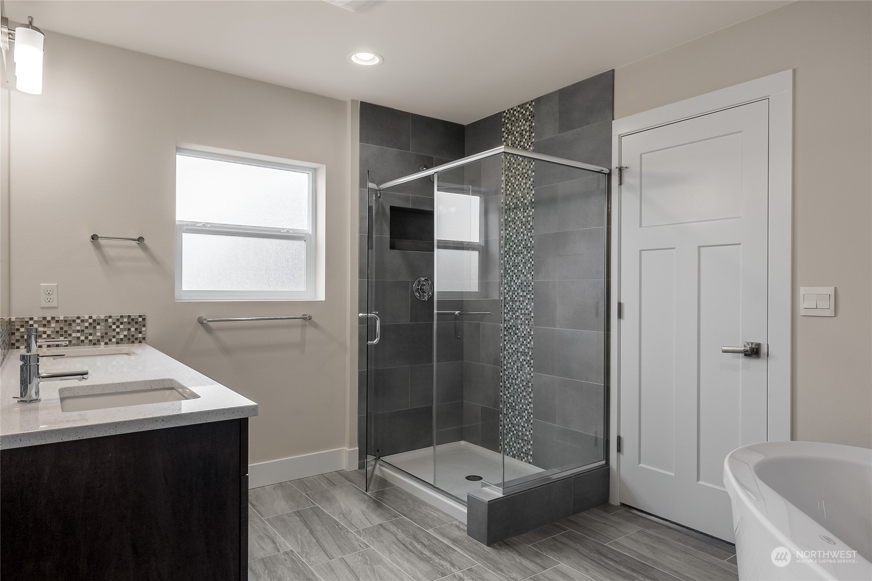 19 178th Place Southwest Bothell, WA 98012 - Photo 5 of 31 a bathroom with a sink a toilet and shower