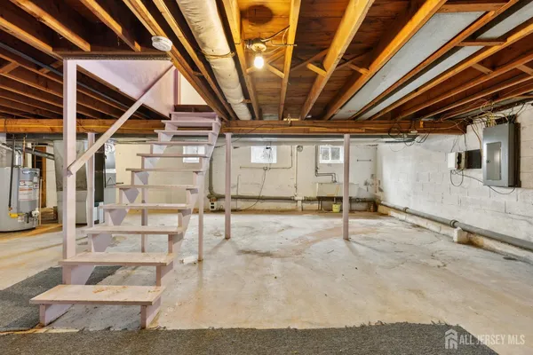 a view of a hall with wooden floor