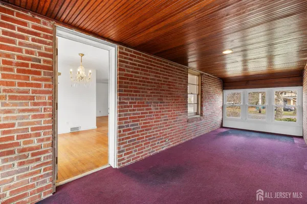 a view of a hallway with front door