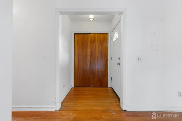 a view of a room with an entryway