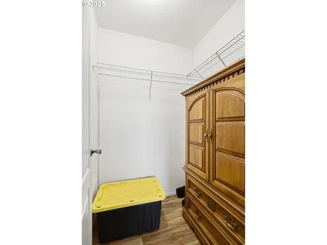 a bathroom with a tub and shower