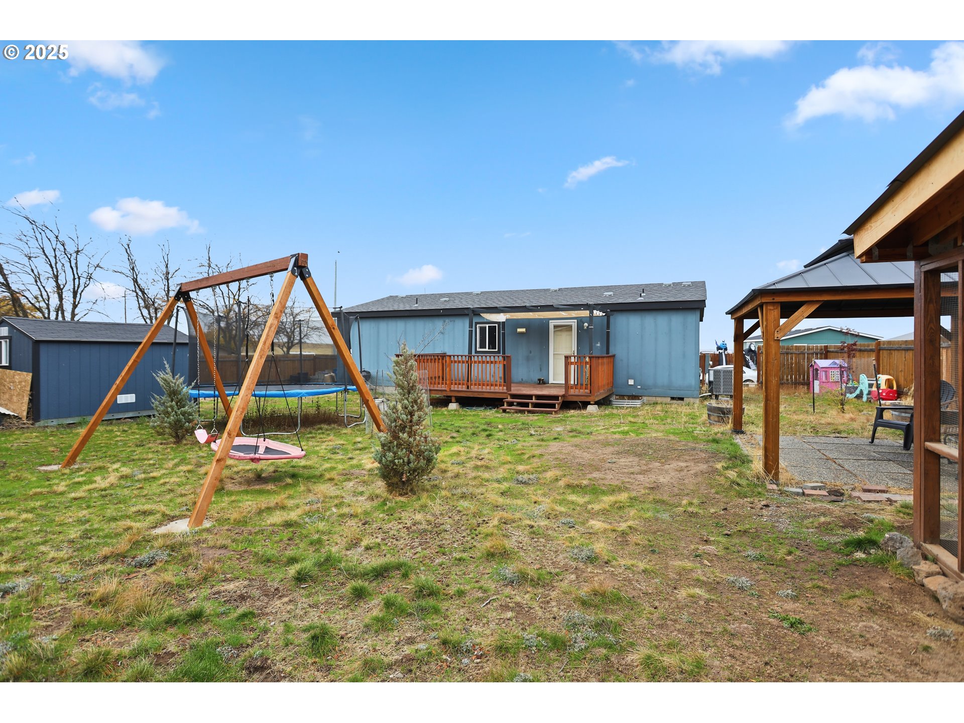 1924 Jaxon Street Goldendale, WA 98620 - Photo 21 of 24 a house view with a swimming pool